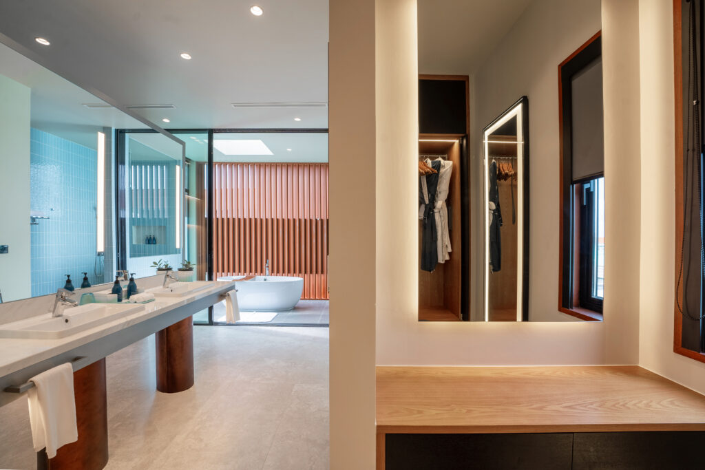 Island Living, Redefined: onestop’s Bespoke Craftsmanship in the Maldives, Veligandu Maldives Resort Island 2 Veligandu SunsetOceanPoolVillaBathroom 1
